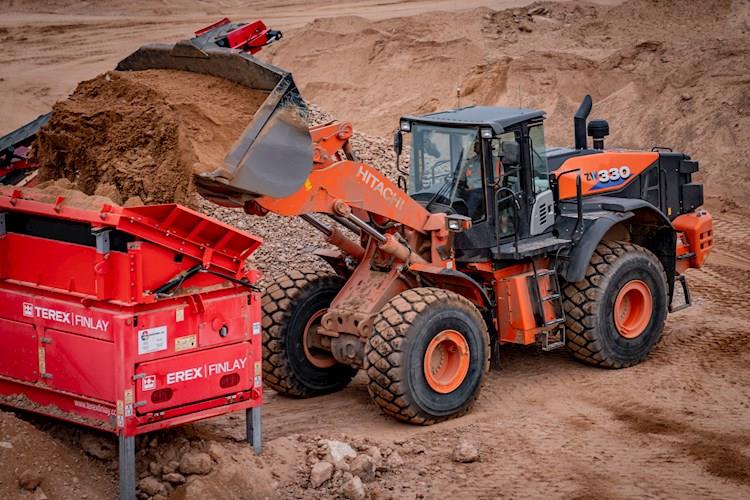 New Hitachi Loader dumping dirt